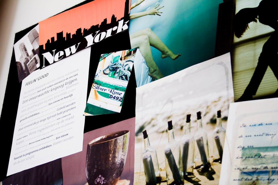Editorial moodboard with printed articles and colored sticky notes